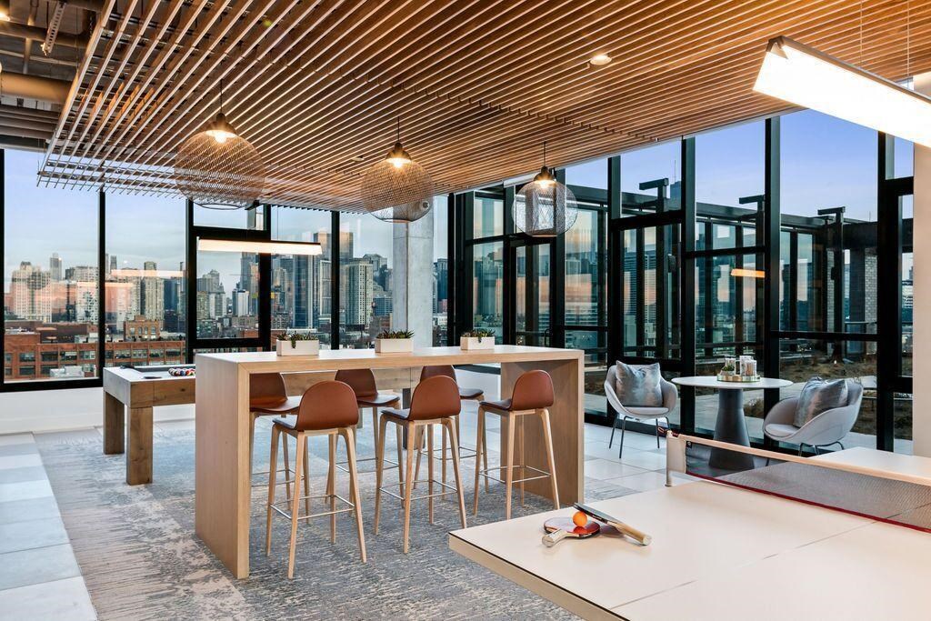 Game room at Avenir River West apartments