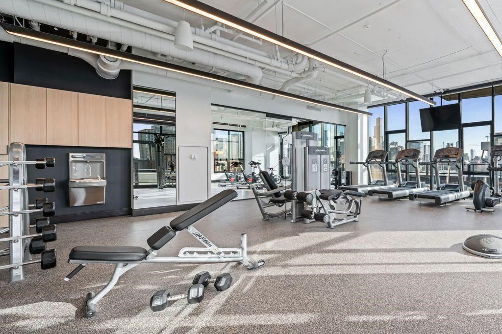 fitness center in River West apartments at Avenir