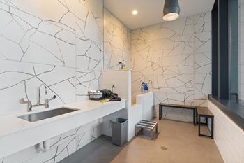 a bathroom with a sink and a window