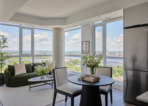 A modern living room with a view of the city.