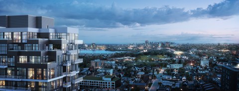 an aerial view of the city at dusk