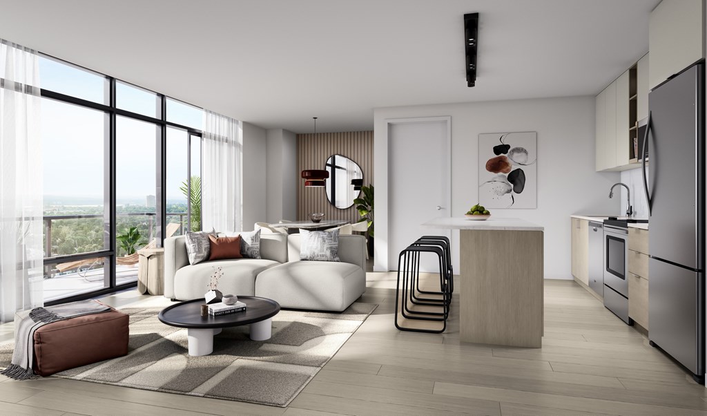 A modern living room with a large window overlooking the city.
