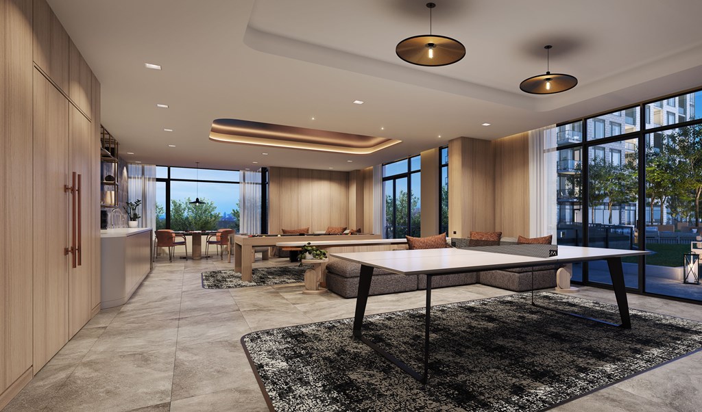 A modern dining room with a large table and chairs.