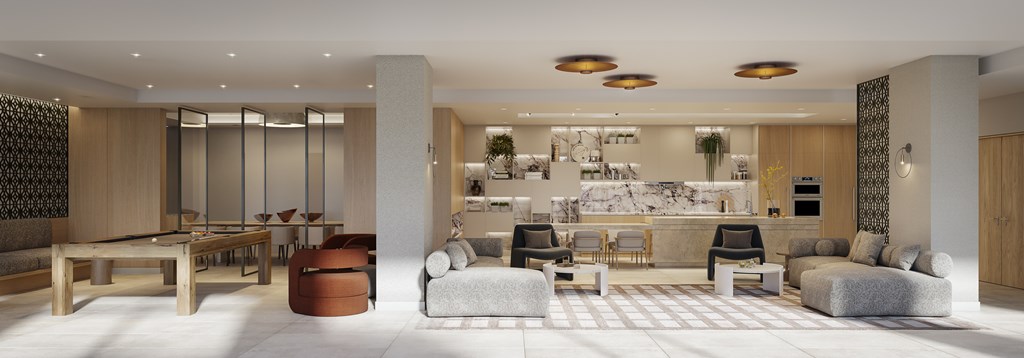 A modern living room with a kitchen in the background.