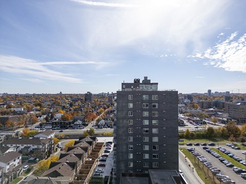 the view of the city from the top of a tall building