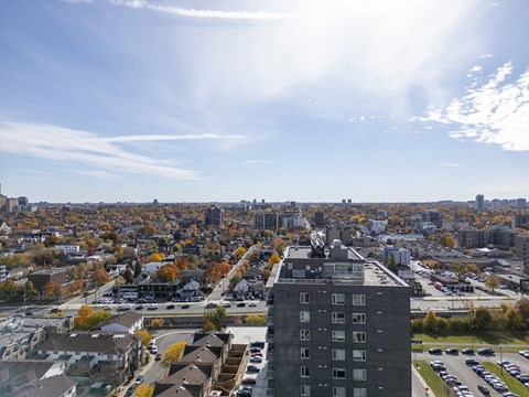 a view of the city from the top of a building