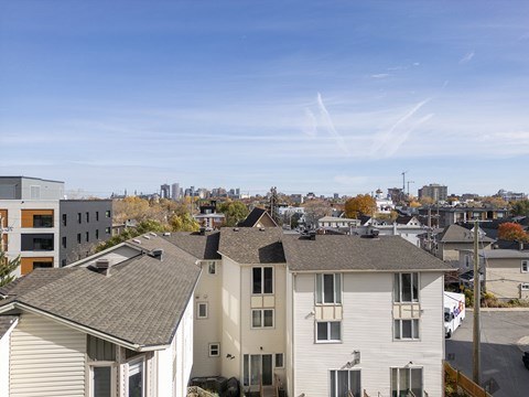 the view of the city from the roof of a house