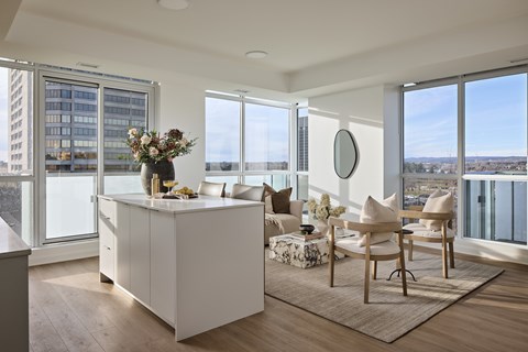 A modern kitchen with a view of the city.