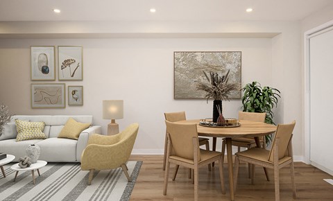 a living and dining area with a table and chairs