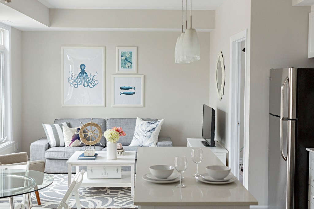 a living room with a couch and a table and a television