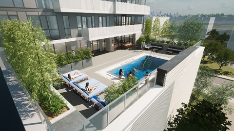 an aerial view of an apartment building with a pool and terraces