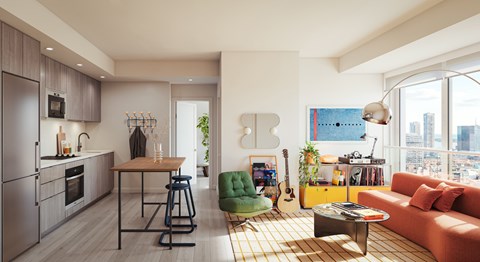 A modern kitchen with a dining area and a living room with a guitar on the wall.