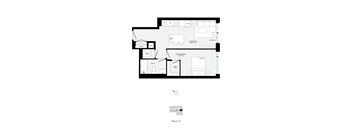 A floor plan of a house with a kitchen, living room, and two bedrooms.