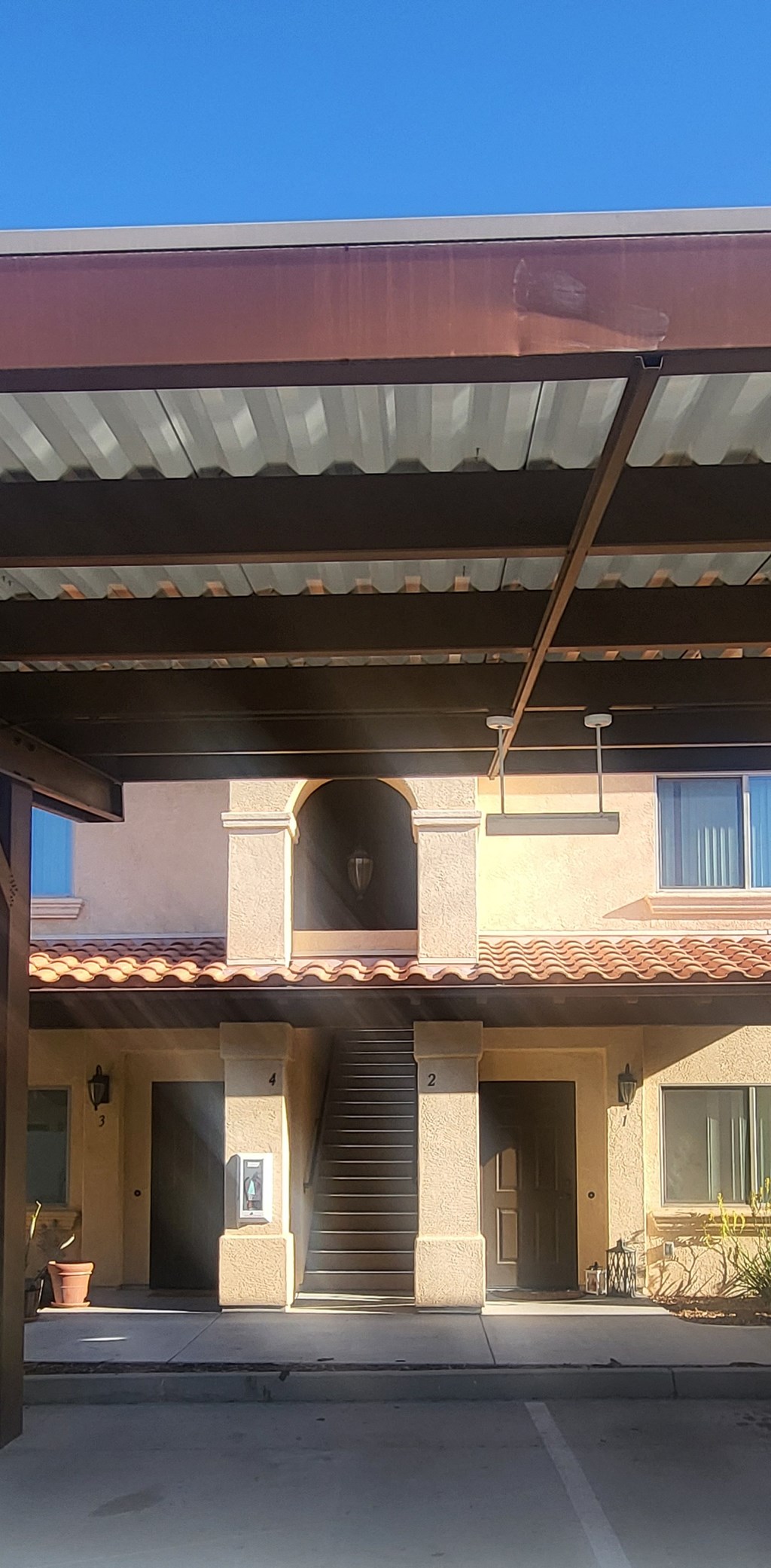 a view of the front of a building with awning