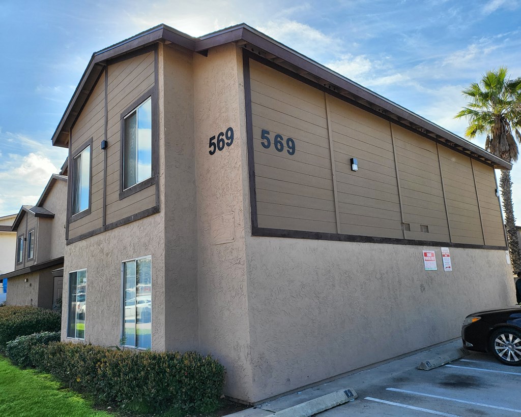 a building with a car parked in front of it