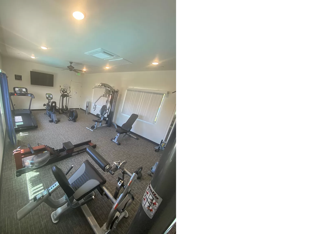 a gym with a lot of chairs and exercise equipment