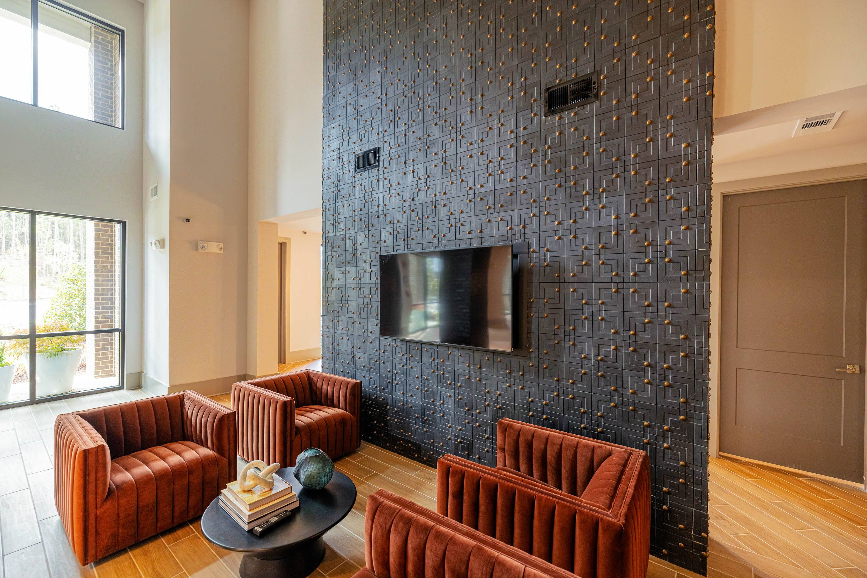 a living room with couches and a television