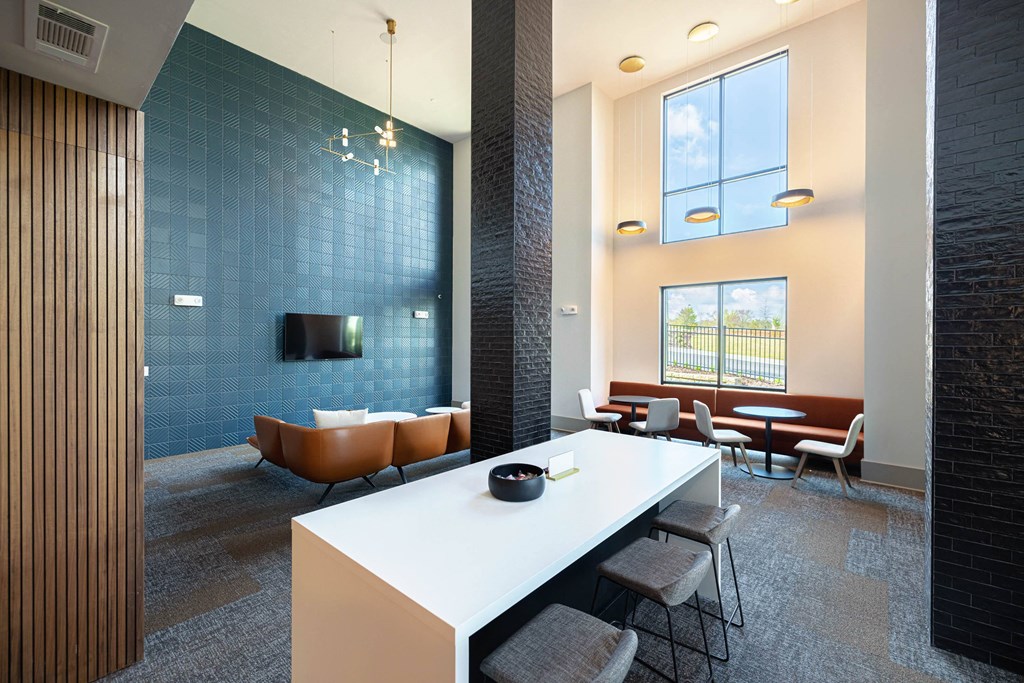 a conference room with a long white table and chairs