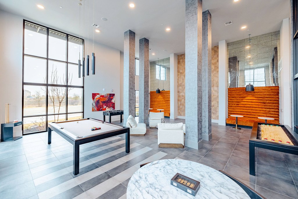 pool table in clubhouse at the district flats apartments in lenexa