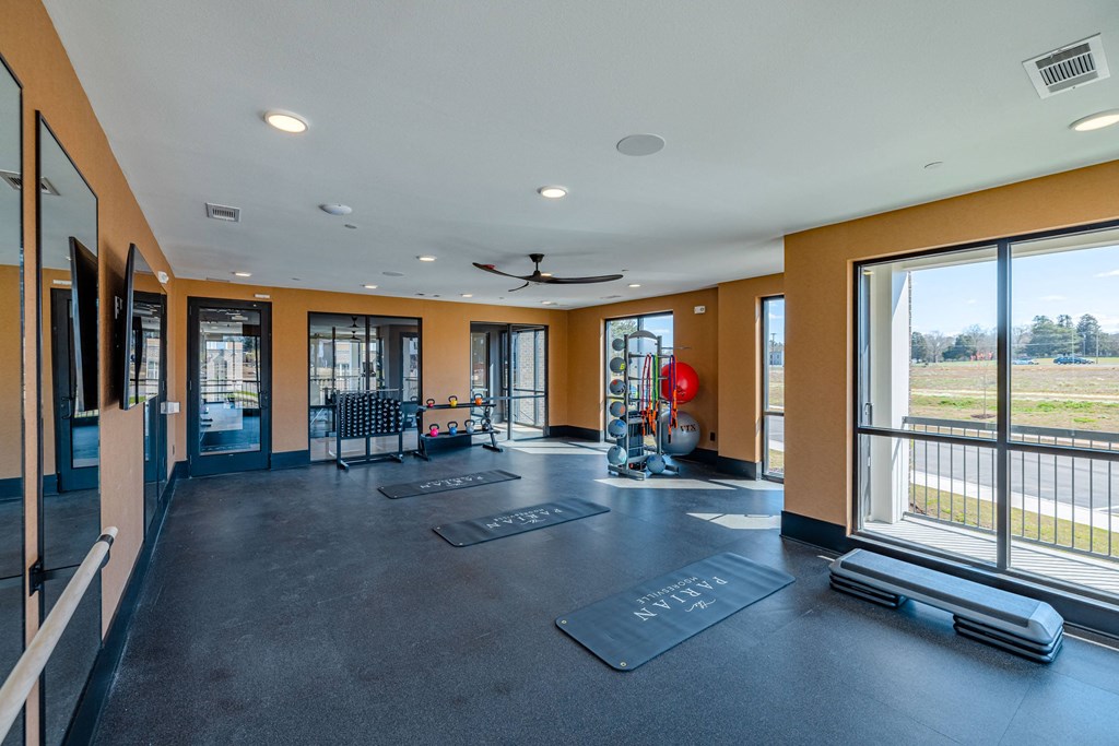 the preserve at ballantyne commons fitness room with yoga mats and windows