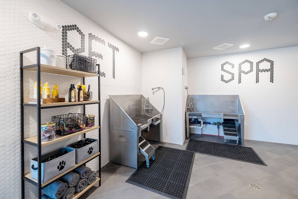 a kitchen with two stainless steel appliances and a sink