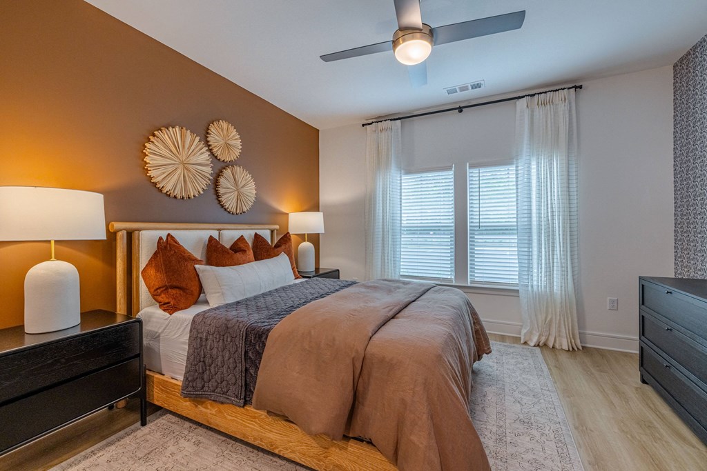 the reserve at city center spacious bedroom with ceiling fan