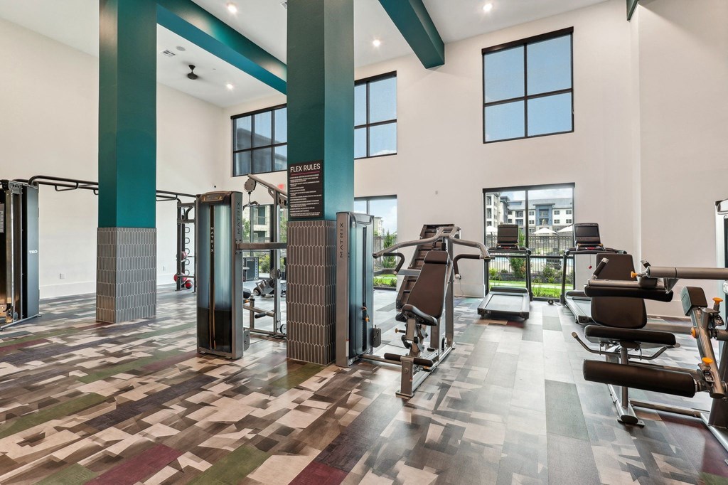 the gym at the flats at big tex apartments