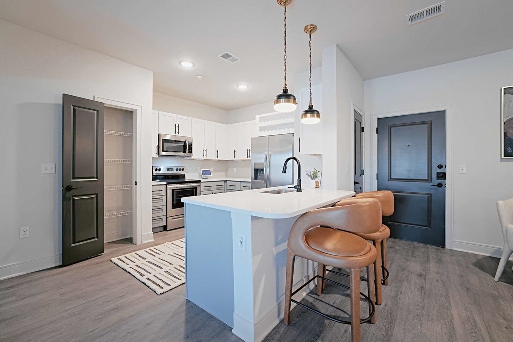 a kitchen with an island and a counter top