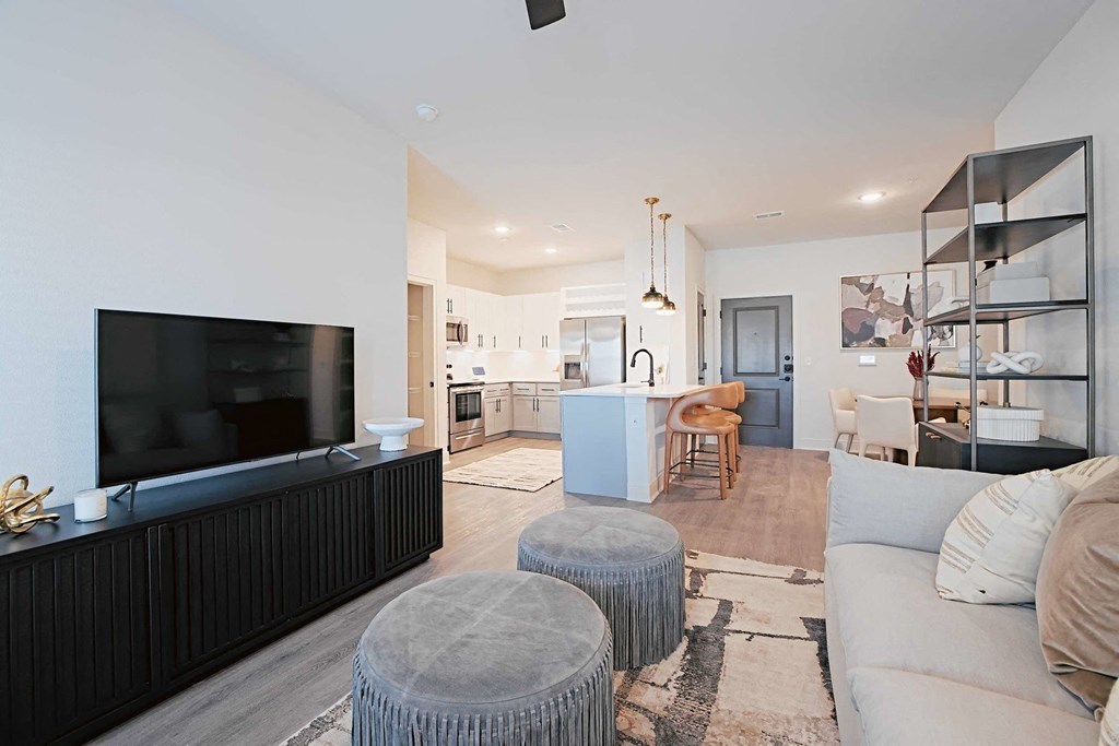 a living room with a couch and a tv