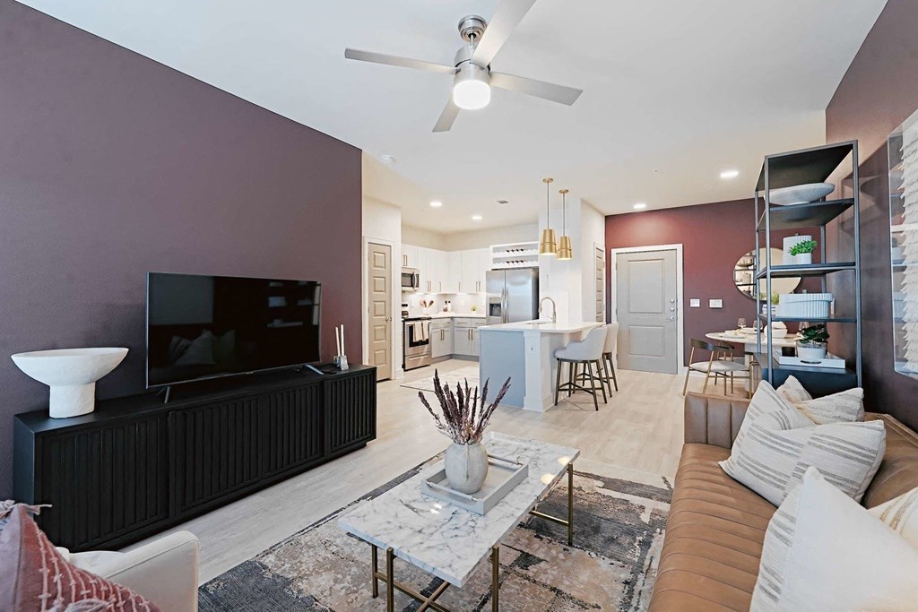 a living room with a couch and a tv