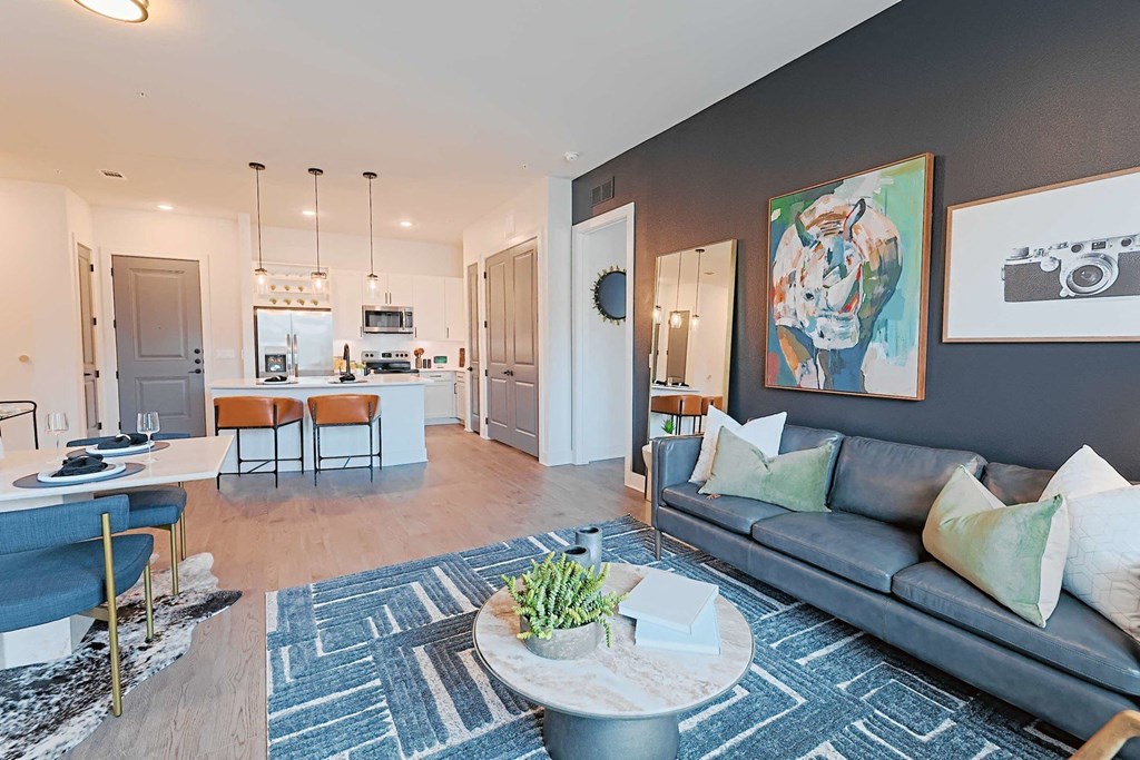 a living room with a couch and a table