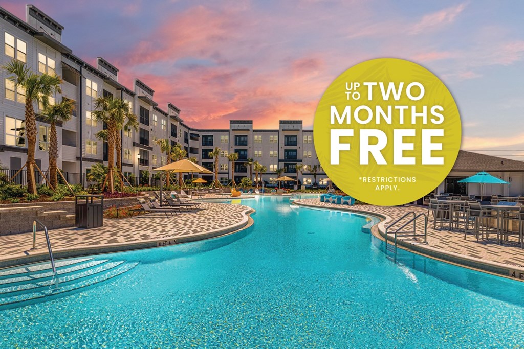 a hotel with a swimming pool and a text saying up to two months free attractions