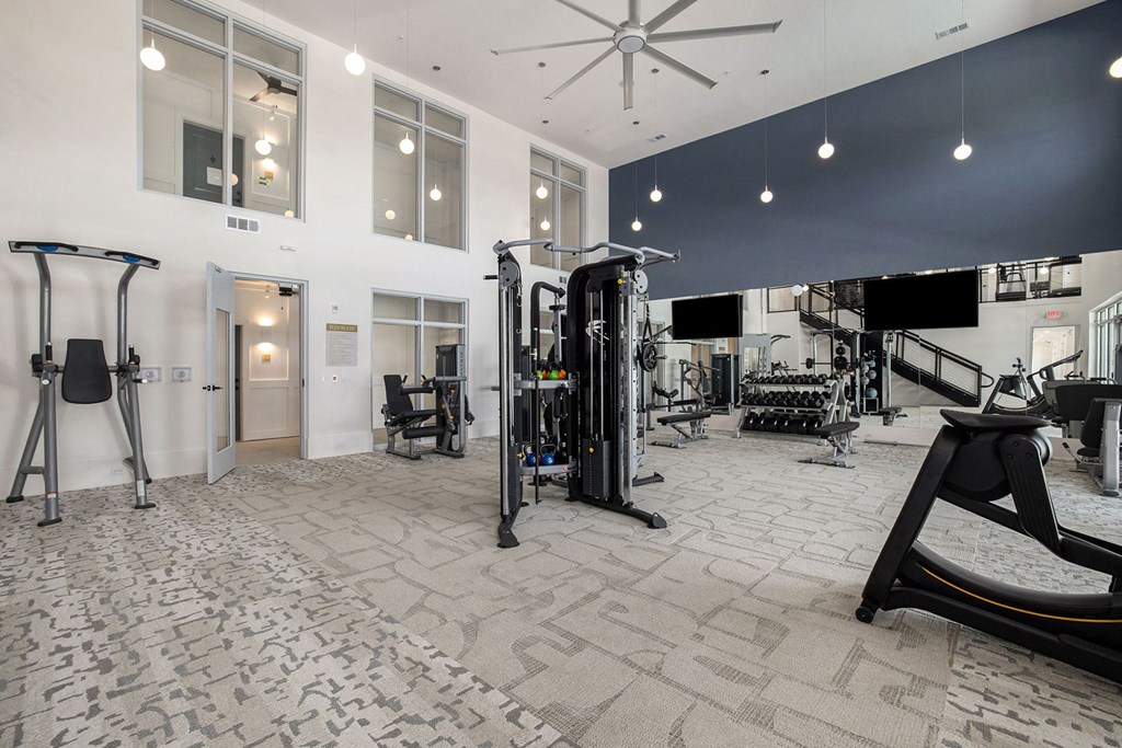 the gym at the preserve at johnsons crossing apartments