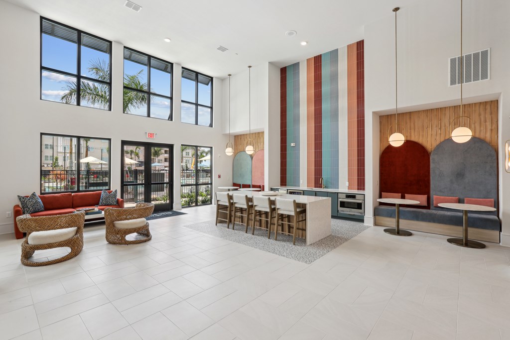 A modern interior with a long table and chairs.