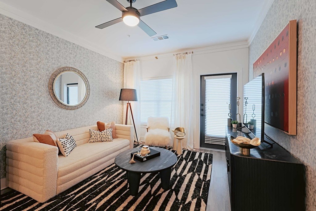 a living room with a couch and a coffee table