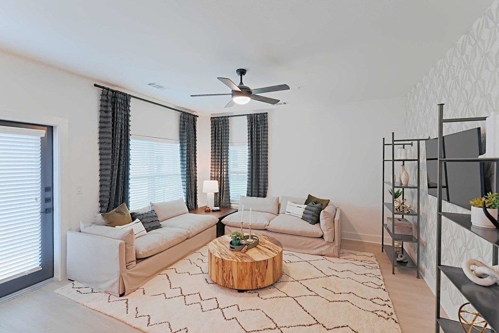 a living room with two couches and a coffee table