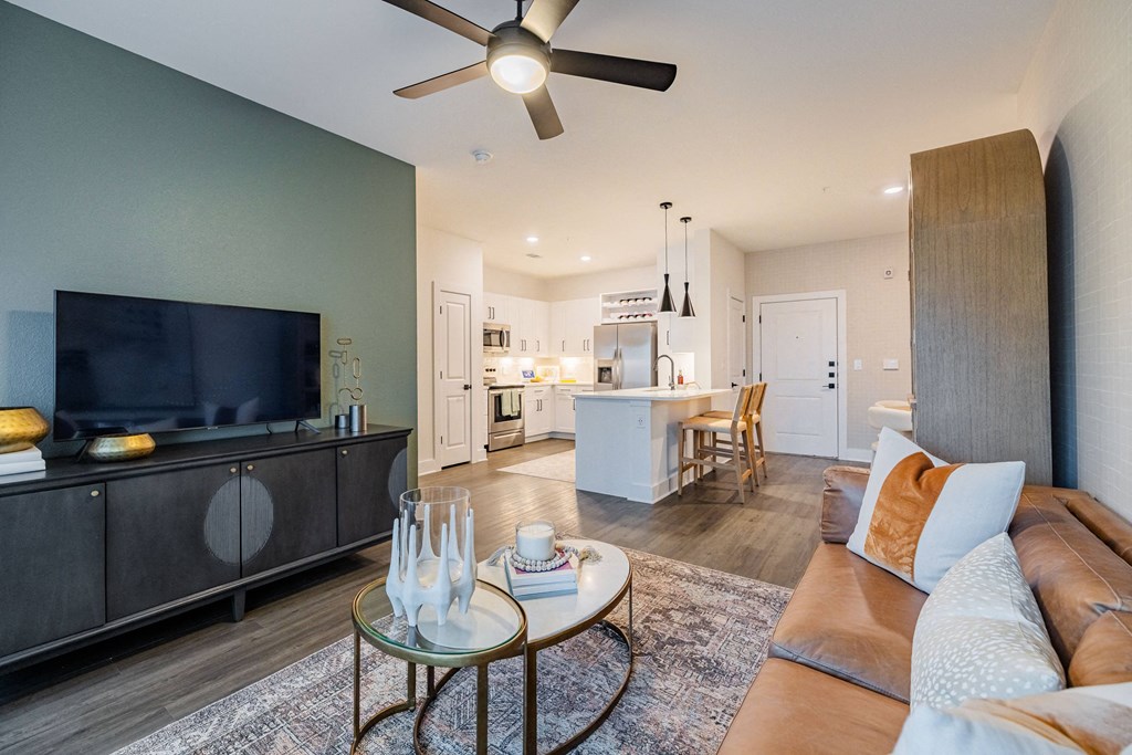 a living room with a couch and a table