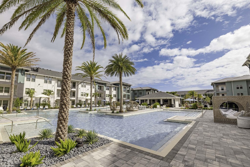 Relaxing Saltwater Pool with Cabanas, Wi-Fi, Sun Shelves, & Sunshade Umbrellas