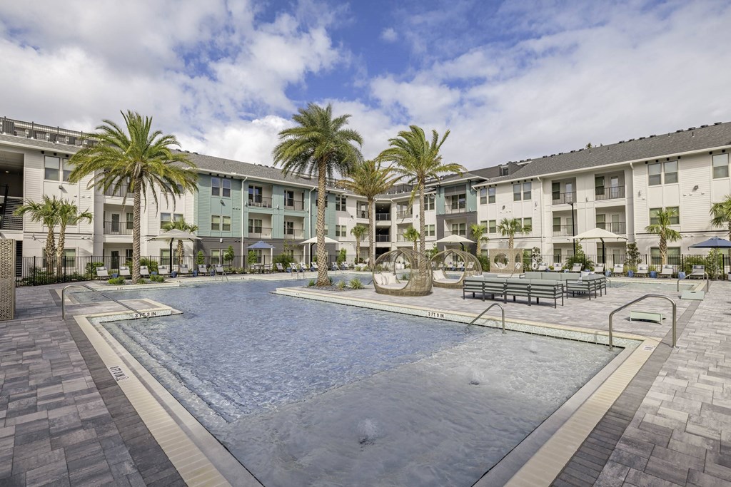 Relaxing Saltwater Pool with Cabanas, Wi-Fi, Sun Shelves, & Sunshade Umbrellas