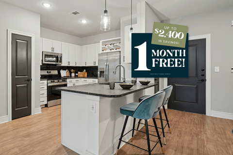 Kitchen with Granite Countertop and Stainless Steel Appliances.