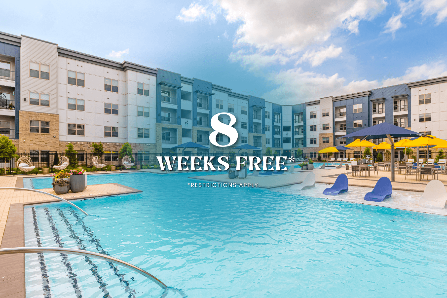 A pool in front of apartment buildings with the text "8 weeks free" on it.