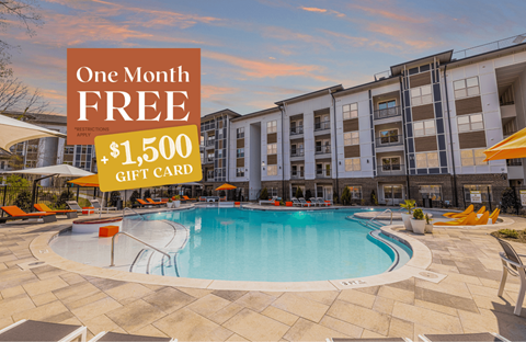 a swimming pool in front of an apartment building with a one month free gift card