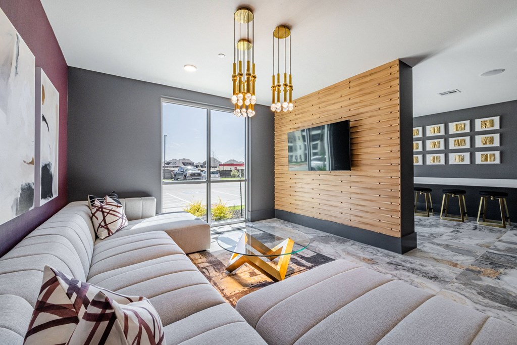 a living room with a couch and a television