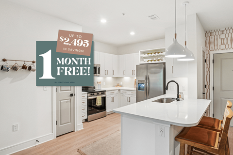 Kitchen with Quartz Countertop and Stainless Steel Appliances.