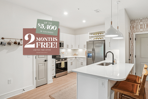 Kitchen with Quartz Countertop and Stainless Steel Appliances.