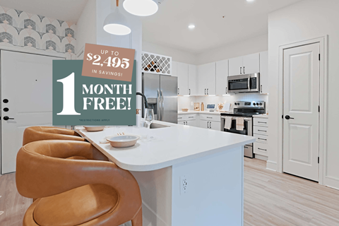 Kitchen with Quartz Countertop and Stainless Steel Appliances.