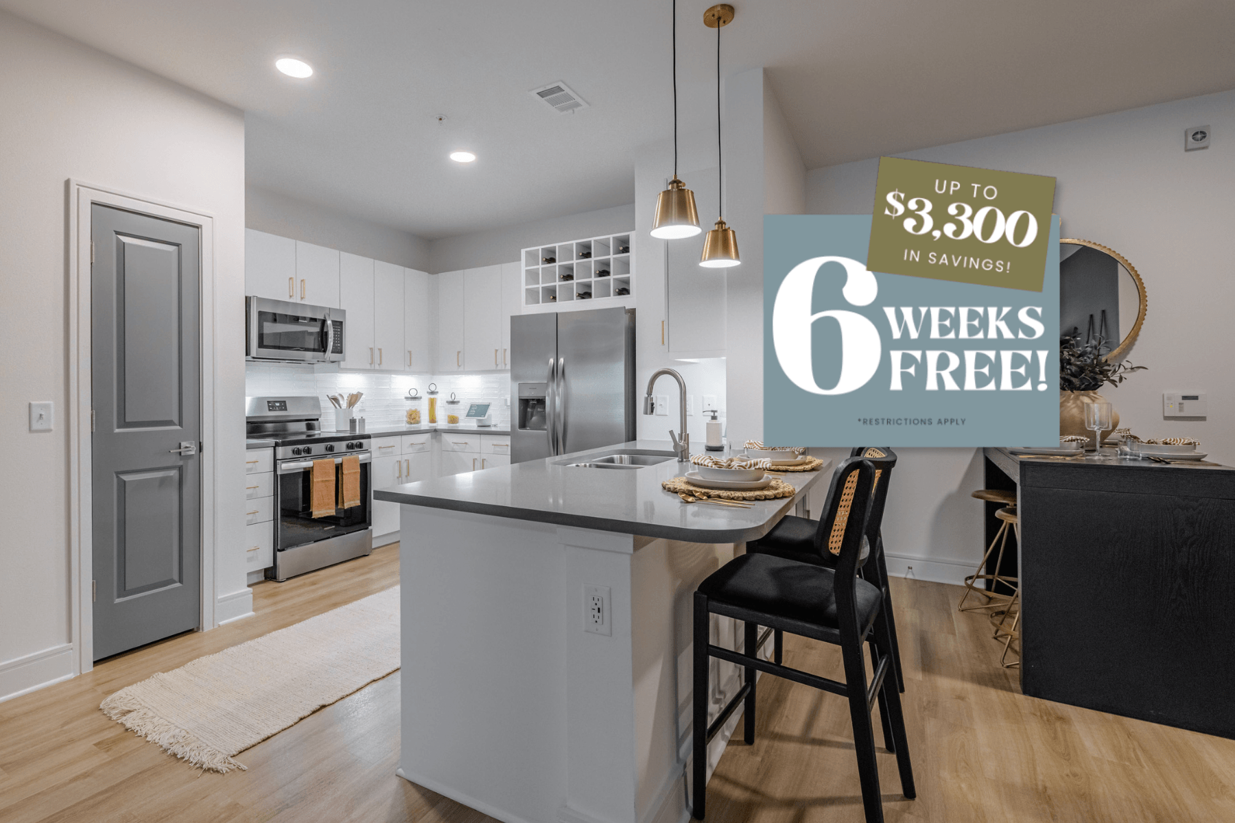 A kitchen with a sign offering $8,300 in savings for 6 weeks free.