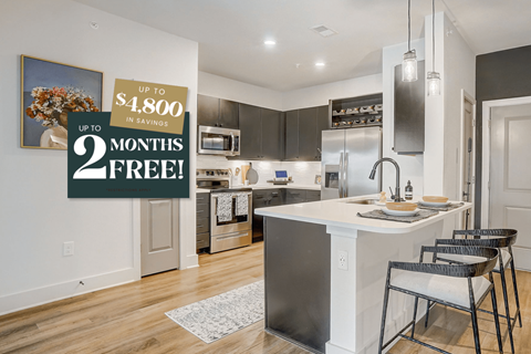 Kitchen with Quartz Countertop and Stainless Steel Appliances.