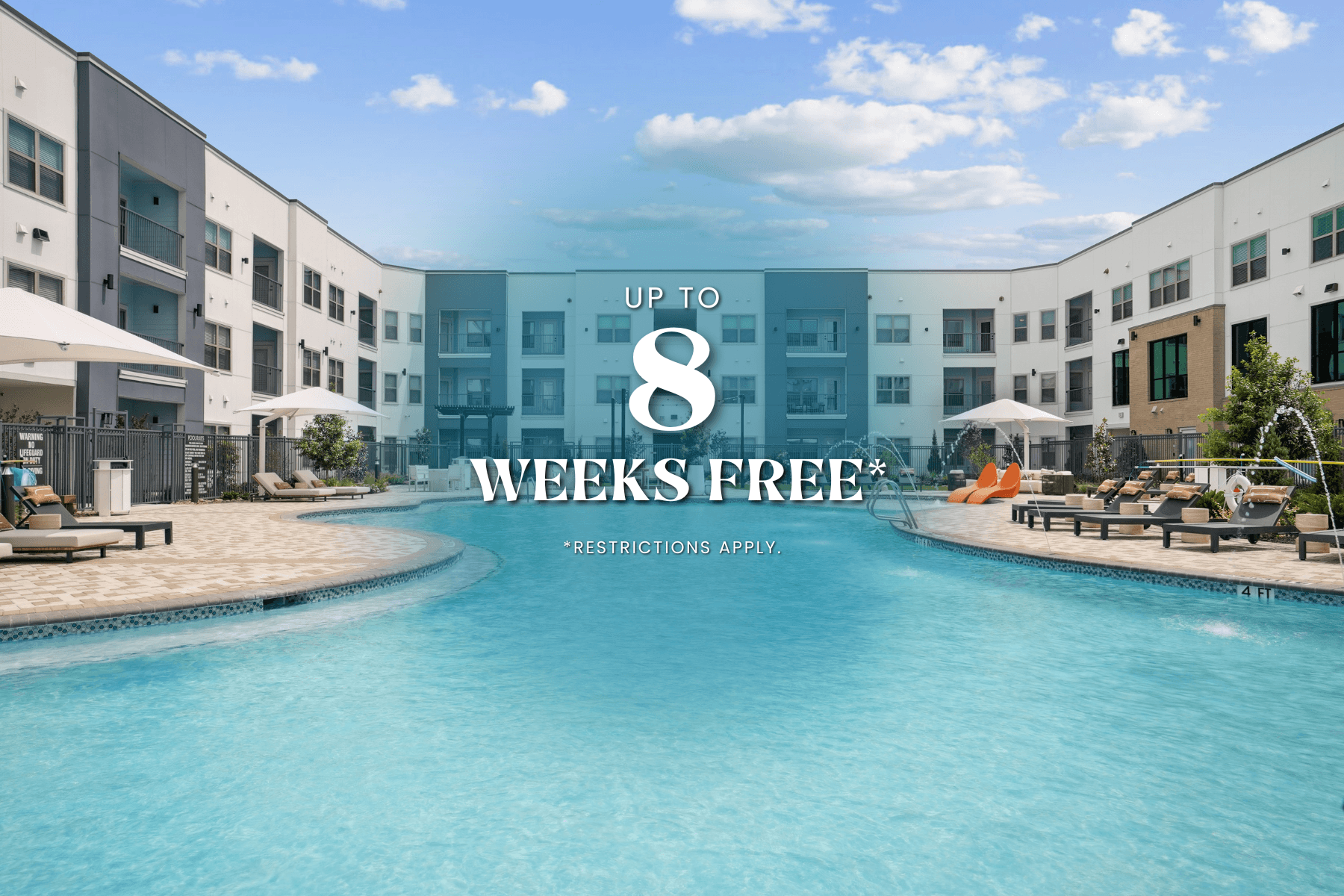 A pool in front of a building with the text "Up to 8 weeks free" on it.