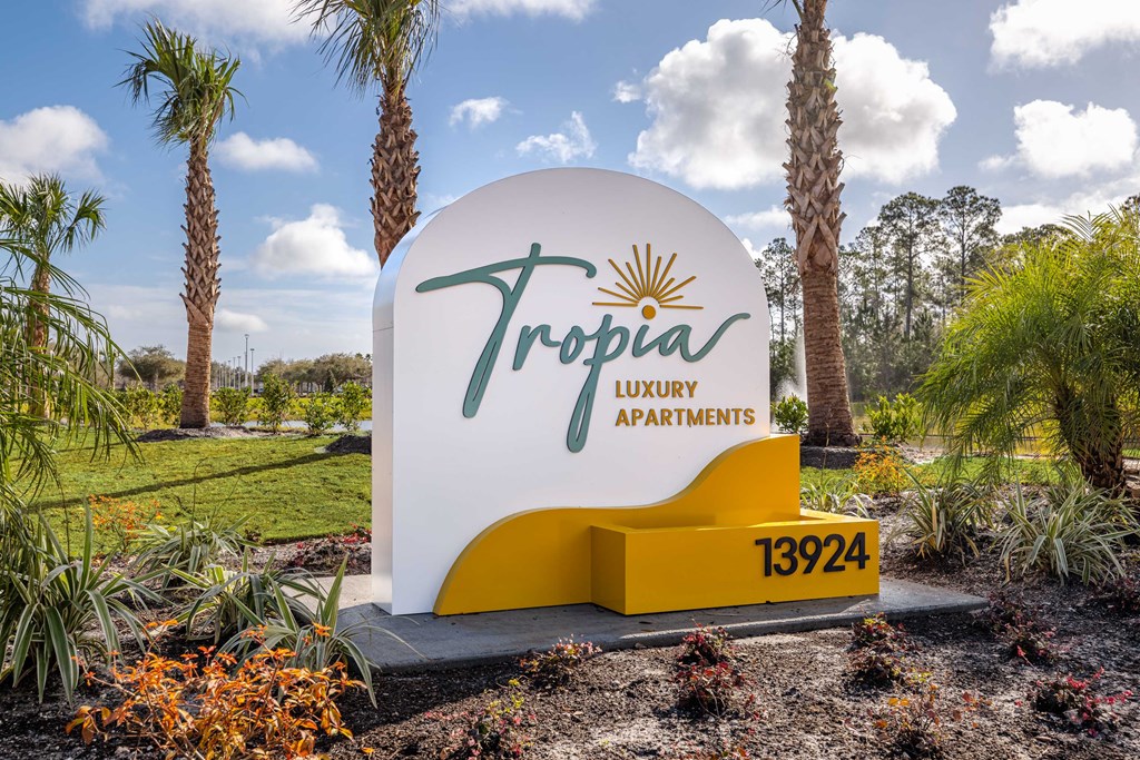 the sign at tropicana luxury apartments